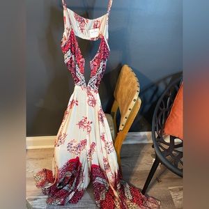 Free People cut-out bohemian romper. Low back very flowy! Size L open back NWT